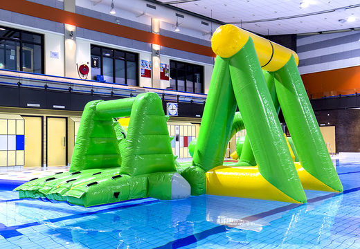Buy an airtight crocodile play island in a pirate theme with a vine, climbing tower, round slide and obstacles for both young and old. Order inflatable water attractions now online at JB Inflatables UK