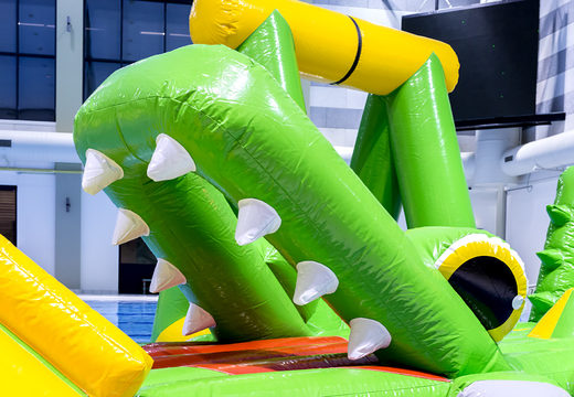 Cool crocodile themed play island with a vine, climbing tower, round slide and obstacles for both young and old. Order inflatable pool games now online at JB Inflatables UK