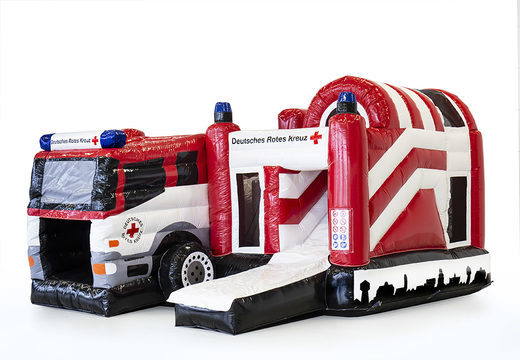 Order the custom made inflatable Red Cross Multiplay inflatable bouncer with slide online at JB Promotions UK; specialist in inflatable advertising items such as custom bouncy castles