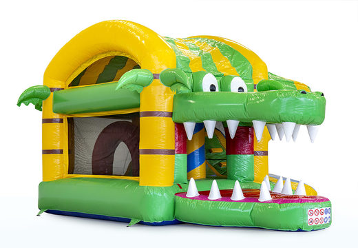 Bouncy castle in crocodile theme with 3D objects inside and a slide for children. Buy inflatable bouncy castles online at JB Inflatables UK