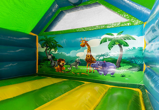 Buy jungle-themed slide combo bouncy castle at JB Inflatables UK. Inflatable bouncy castles with slide for sale