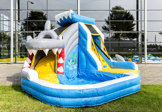 Buy large inflatable bouncy castle with pool in the theme of splashy shark for children. Order bouncy castles online at JB Inflatables UK