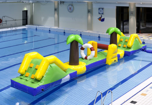 Order 12 meter long inflatable Hawaii run obstacle course with 2 slides for both young and old. Buy inflatable obstacle courses online now at JB Inflatables UK