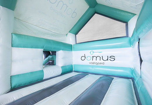 Buy promotional inflatable Domus Multifun House with slide bouncers online at JB Promotions UK. Custom made bouncy castles in all shapes and sizes available