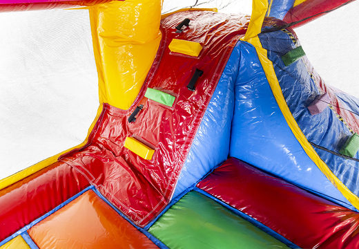 Superblocks themed bounce house with slide and with 3D objects inside for kids. Buy inflatable bounce houses online at JB Inflatables UK