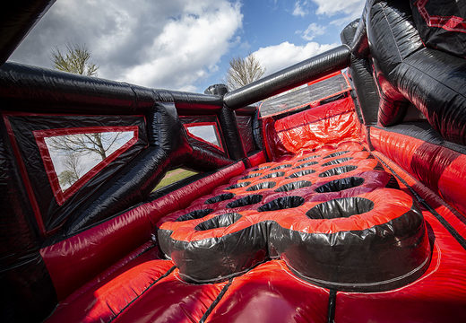 Mega 40 meter long inflatable red black mega alligator obstacle course. Order inflatable obstacle courses online now at JB Promotions UK