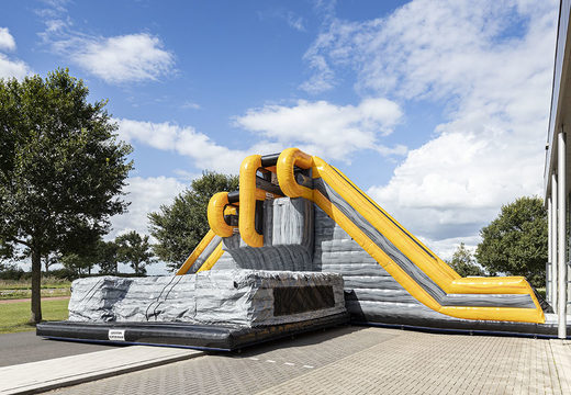 Order inflatable Base Jump Pro Slide of 4 and 6 meters high and with an extra thick fall mat for both young and old. Buy inflatable attraction now online at JB Inflatables UK