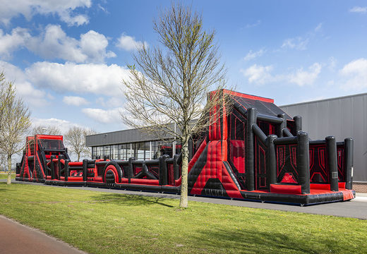 Order a unique 40 meter long red black mega alligator obstacle course. Buy inflatable obstacle courses online now at JB Inflatables UK