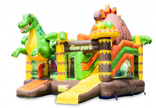 Buy a covered inflatable bouncy castle in the theme dinoworld with slide, for children. Order bouncy castles online at JB Inflatables UK