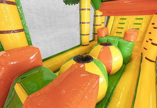 Jungle inflatable 19 meter obstacle course with suitable 3D objects for children. Buy inflatable obstacle courses online now at JB Inflatables UK
