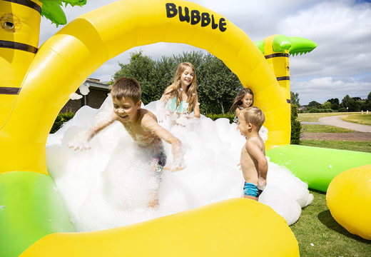 Bubble park bouncy castle with a foam crane in the Jungle theme for children. Buy inflatable bouncy castles online at JB Inflatables UK