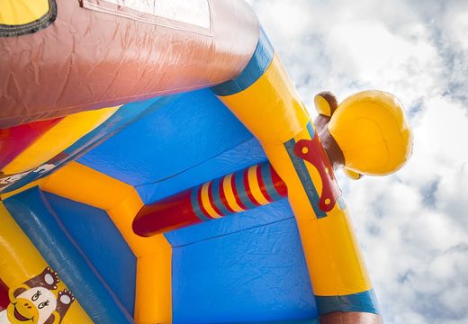 Order a standard bouncy castle for children in striking colors with a large 3D object in the shape of a monkey on top. Bouncy castles for sale online at JB Inflatables UK