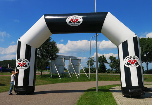 Buy a custom made Heracles almelo inflatable advertisement arch at JB Promotions UK. Request a free design for an advertising inflatable arch in your own style now
