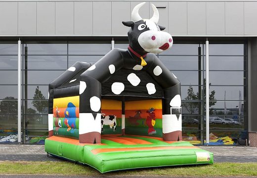 Order a standard bouncer in striking colors with a large 3D object of a cow on top for children. Order bouncers online at JB Inflatables UK