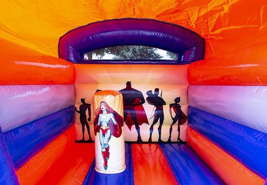Small roofed inflatable bouncy castle for commercial use to buy in superhero theme. Available at JB Inflatables UK online 
