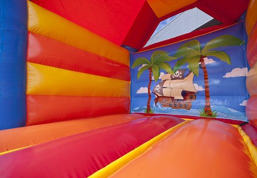 Buy a midi bounce house in a color combination of red blue orange and yellow with a pirate theme for kids. Visit JB Inflatables UK online