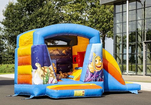 Order a small multifun blue inflatable bouncy castle with roof for kids in seaworld theme. Buy bouncy castles online at JB Inflatables UK 