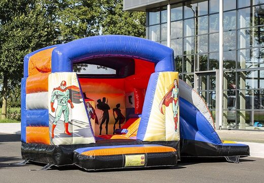Small multifun inflatable bouncer with roof in superhero theme blue and orange for sale. Buy bouncers at JB Inflatables UK online
