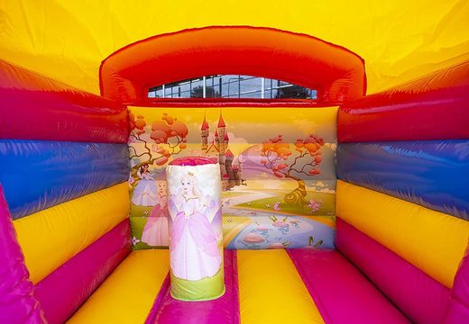 Small inflatable bouncy castle yellow and pink in princess fairytale theme to buy.  Buy bouncy castles at JB Inflatables UK online