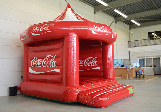 Buy promotional custom made Coca-Cola Carousel bouncy castle. Order now inflatable advertising bouncy castles in your own corporate identity at JB Inflatables UK