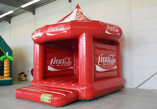 Buy custom made inflatable Coca-Cola Carousel bouncy castle at JB Promotions UK. Promotional bouncy castles in all shapes and sizes availble at JB Promotions UK