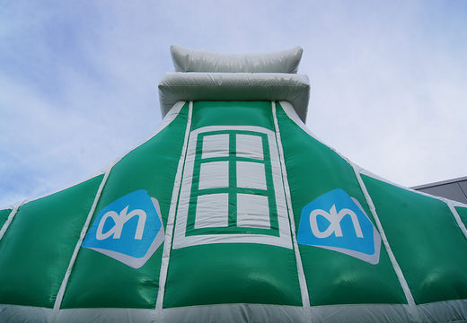 Bespoke Albert Heijn Zaanhuisje bouncy castle ideal for various events. Buy custom made inflatable promotional bouncers online from JB Inflatables UK now