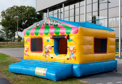 Large indoor ball pit bouncy castle in circus theme for children. Order bouncy castles online at JB Inflatables UK