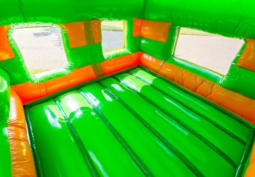 Order covered inflatable ball pit bounce house in jungle theme for kids. Buy bounce houses online at JB Inflatables UK