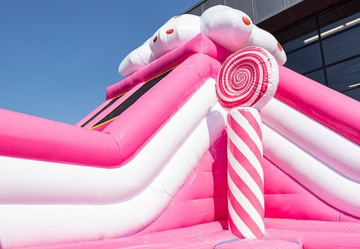 Candyworld themed inflatable bouncer with slides and fun printed obstacles for children. Buy bouncers online at JB Inflatables UK