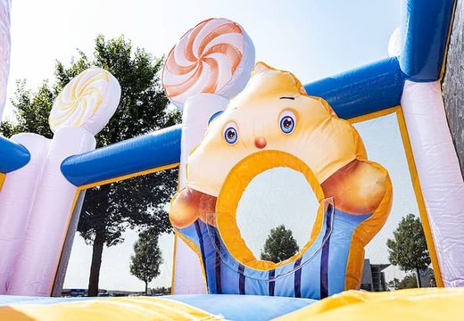 Get a big candyland themed inflatable bouncer with multiple slides and all sorts of fun obstacles with themed prints for kids. Order bouncers online at JB Inflatables UK