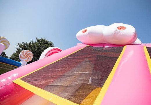 Candyworld bouncer with slides, obstacles with fun candy-themed prints for kids. Buy bouncers online at JB Inflatables UK
