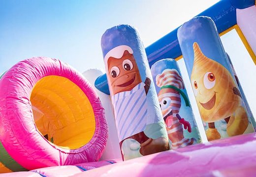 Buy Candyworld bouncy castle with slides, obstacles with fun candy-themed prints for kids. Order bouncy castles online at JB Inflatables UK