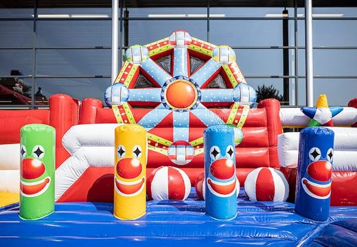 Circus bouncy castle with slides, obstacles with fun circus themed prints for kids. Order bouncy castles online at JB Inflatables UK