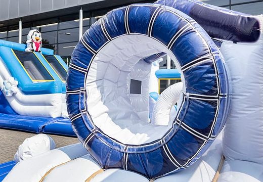 World Frozen bouncy castle with multiple slides and all kinds of obstacles with prints that match the theme for kids. Buy bouncy castles online at JB Inflatables UK