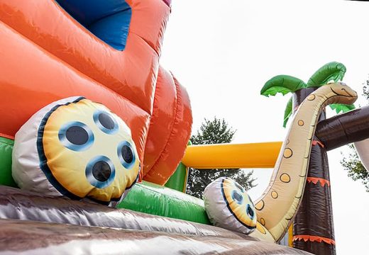 Jungle themed inflatable bouncy castle with slides and fun obstacles with prints for children. Buy bouncy castles online at JB Inflatables UK