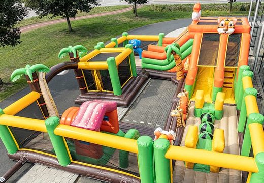 Buy a jungle bouncy castle with slides, obstacles and fun jungle-themed prints for kids. Order bouncy castles online at JB Inflatables UK