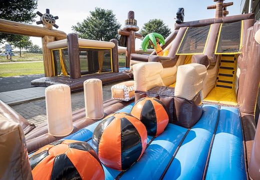 Inflatable pirate bouncer with slides and fun obstacles with prints for children. Buy bouncers online at JB Inflatables UK