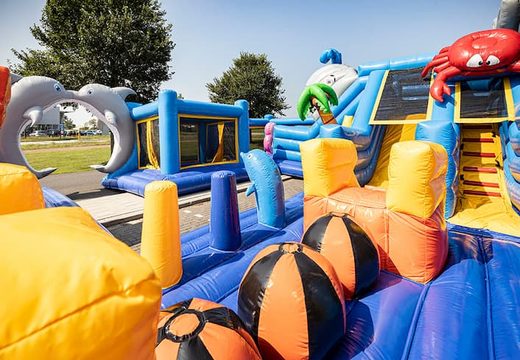 Seaworld bouncer with slides, obstacles with fun seaworld themed prints for kids. Buy bouncers online at JB Inflatables UK