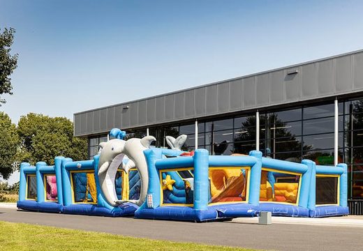 Bounce World seaworld bouncy castle with multiple slides and all kinds of fun obstacles with seaworld prints for children. Buy bouncy castles online at JB Inflatables UK