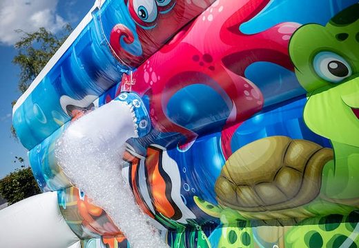 Open Bubble park seaworld with a foam crane to use for kids. Order inflatable bouncers at JB Inflatables UK
