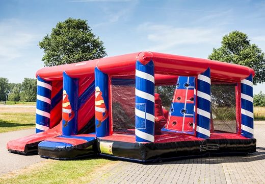 Buy indoor multiplay fire brigade bouncy castle in a limited height of 2.74 meters and with a slide for children. Order bouncy castles online at JB Inflatables UK