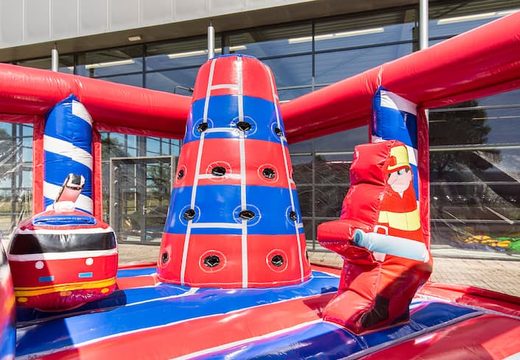 Buy a large Indoor fire brigade bouncy castle with a slide on the jumping surface, climbing tower and fun obstacles with fire-themed prints for kids. Order inflatable bouncy castles online at JB Inflatables UK.