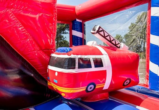 Indoor fire brigade bouncy castle with a slide for children. Buy bouncy castles online at JB Inflatables UK