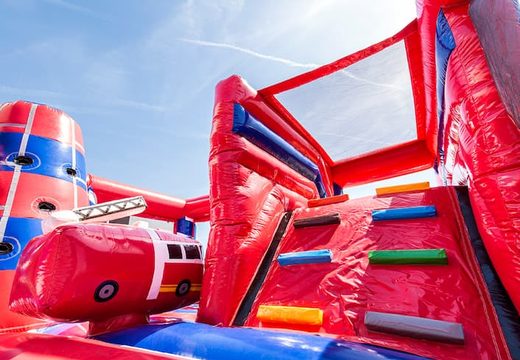 Order a covered multiplay fire brigade bouncer in a limited height of 2.74 meters and with a slide for both old and young. Buy bouncers online at JB Inflatables UK