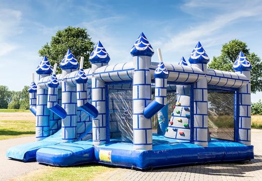 Multiplay indoor castle bouncy castle with a slide for kids. Buy bouncy castles online at JB Inflatables UK