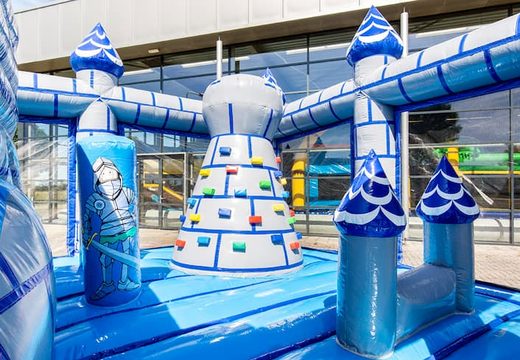 Order a bouncy castle in a castle theme with a slide for children. Order bouncy castles online at JB Inflatables UK