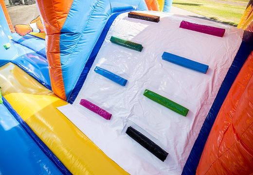 Order a large Indoor sea bounce house with a slide on the jumping surface, climbing tower and fun obstacles in seaworld themed with prints for kids. Buy bounce houses online at JB Inflatables UK