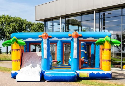 Buy a large Indoor seaworld bouncy castle with a slide on the jumping surface, climbing tower and fun obstacles with sea-themed prints for kids. Order bouncy castles online at JB Inflatables UK.