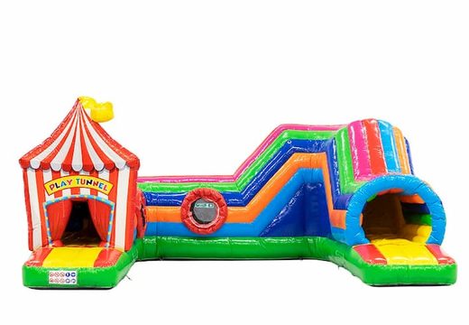 Buy a large circus bouncy castle with obstacles, a climbing slope and a slide for children. Order bouncy castles online at JB Inflatables UK