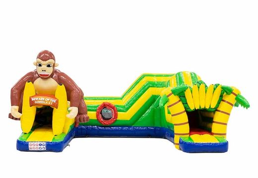 Buy a large gorilla bouncy castle with obstacles, a climbing slope and a slide for children. Order bouncy castles online at JB Inflatables UK